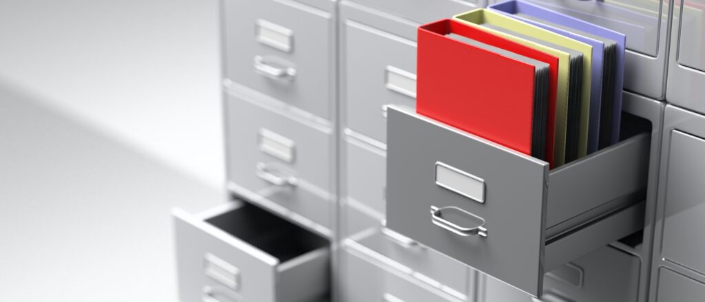 Office document binders in a filing cabinet drawer. 3d illustration